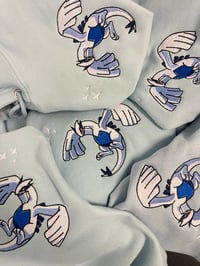 Image 1 of Lugia Embroidered hoodie 💙 (baby blue) 