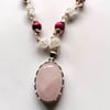 Rose Quartz Pendant on a beaded wrapped necklace