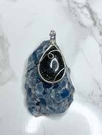 black sunstone and tanzanite pendant