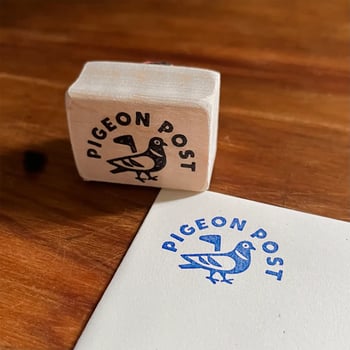 Rubber stamp with a Pigeon Post design