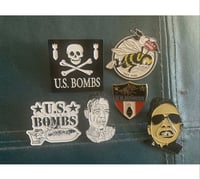 US BOMBS laminate pins (only five . shield is gone)