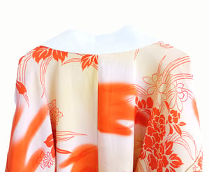 Image of Silke kimono i gule og orange farver med iris