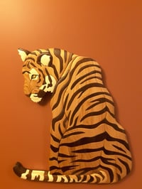 Image 1 of Sitting Tiger Looking Over Shoulder