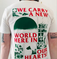 Image 2 of WE CARRY A NEW WORLD IN OUR HEARTS! FRONT & BACK PRINT T-SHIRT