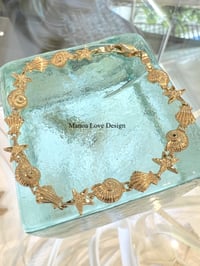 Image 1 of 14k seashell & starfish Hawaiian bracelet 