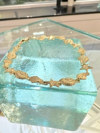 Image 2 of 14k seashell & starfish Hawaiian bracelet 
