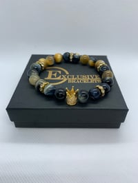 Image 1 of Black and Yellow Gold w/Gold Accents