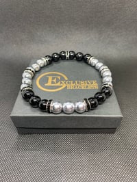 Image 1 of Black and Silver
