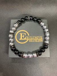 Image 2 of Black and Silver