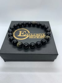 Image 1 of Black with Gold