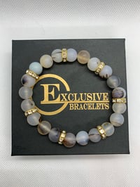 Image 1 of Brown Natural Stone w/Gold Accents