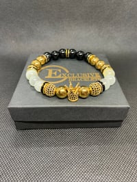 Image 1 of Black White Gold Crown w/Gold Crown