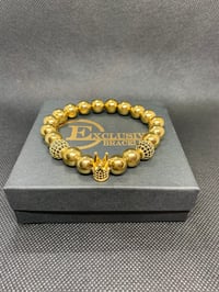 Image 1 of Gold and Gold Crown w/Gold and Black Accents