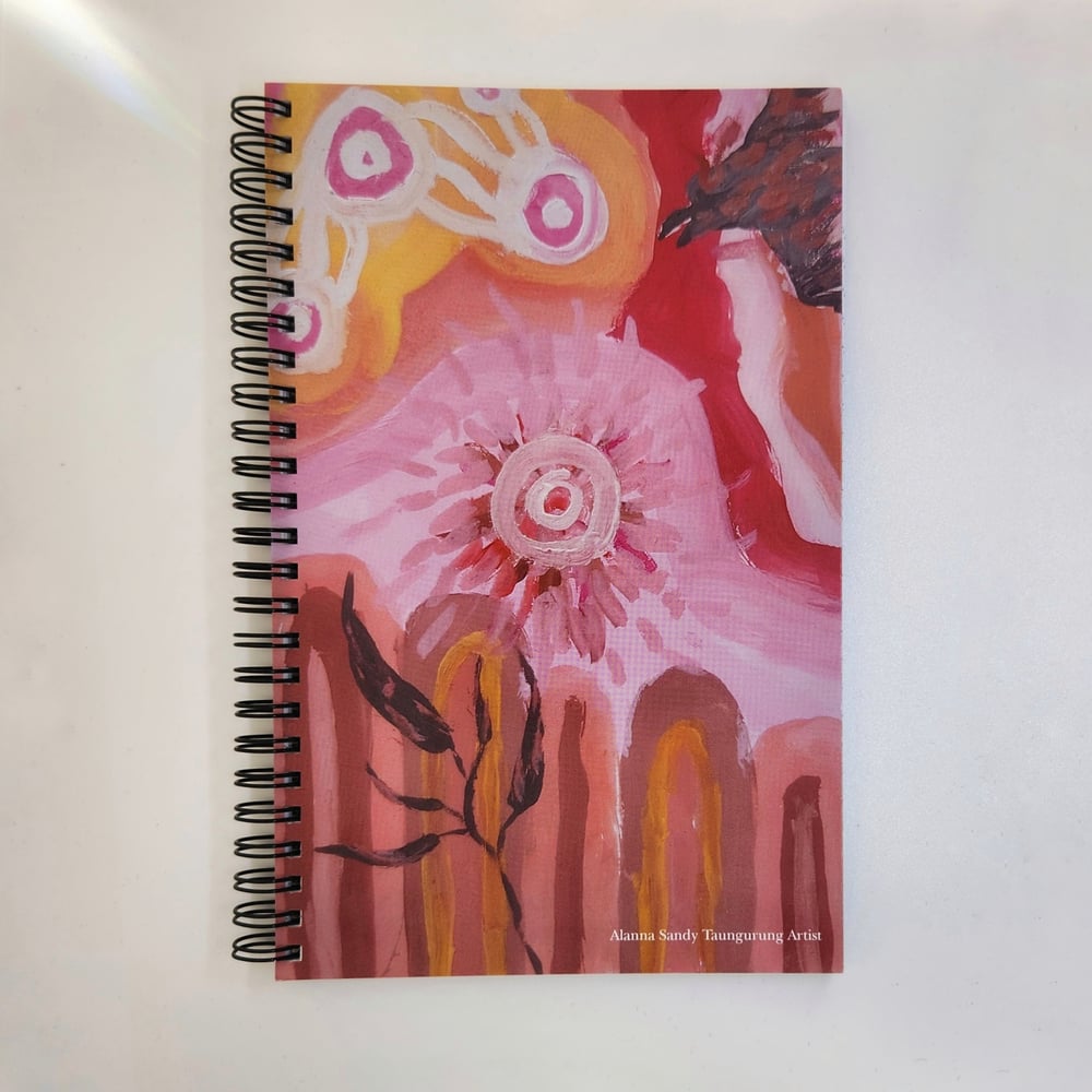 Image of Notebook - Crow flying over hills