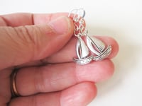 Image 2 of Silver Sailboat Charm Earrings, Pierced or Clip On 