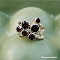 Image 2 of Cassiopeia 6 Faceted Garnet Ring