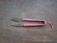 Image 1 of Japanese Thread Snips with red tassel.