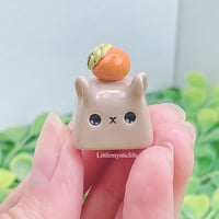 Image 3 of capybara with orange ceramic keycap 