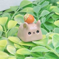 Image 1 of capybara with orange ceramic keycap 