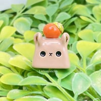 Image 1 of cute capybara with orange ceramic keycap