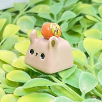 Image 2 of cute capybara with orange ceramic keycap