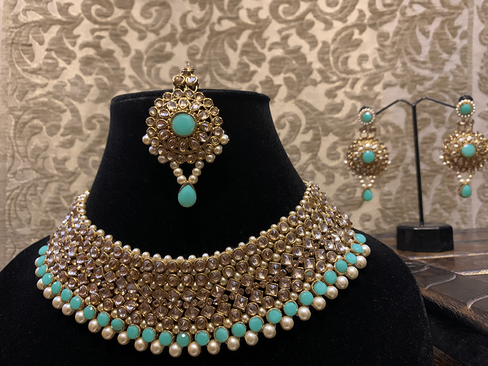 Turquoise on sale kundan jewellery