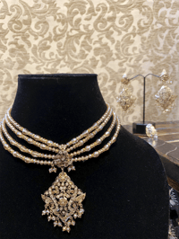 Image 1 of Whispers of Crystal and Beads: A Hyderabadi Jewelry Set in Off-White and Peach