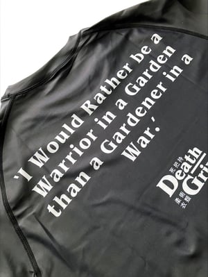 Image of 'Peaceful Warrior' rashguard.