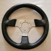 VOLANT CUIR PU NOIR ET ALU BROSSE