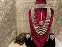 Image 3 of Romantic Radiance: White Kundan and Pearl Bridal Set - Choker Necklace, Earrings, and Tika