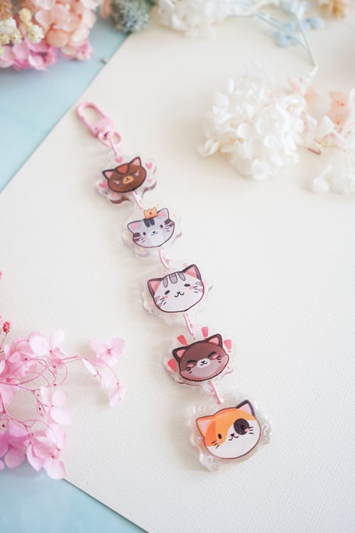 Image of Family of Cute Cats Linking Charm