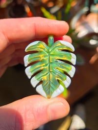 Image 1 of Green uv variegated monstera leaf pendant 