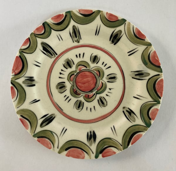 Image of Green and pink teacup and plate