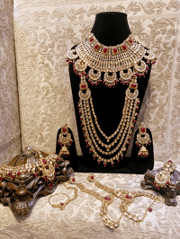 Image 1 of Regal Elegance: Pink Hue Kundan and Wine Red Stone Bridal Set (includes every accessory)