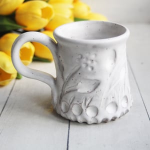 Image of Hand Carved Pottery Mug with Spring Flowers, Rustic White Speckled Coffee Cup