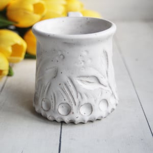 Image of Hand Carved Pottery Mug with Spring Flowers, Rustic White Speckled Coffee Cup