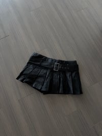Image 1 of black skirt/ shorts (sz medium)