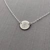 Tiny Sterling Silver Dogwood Circle Necklace, light finish