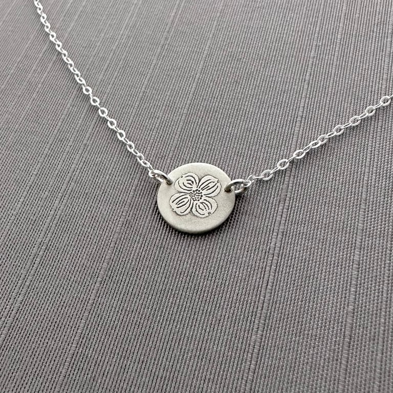 Tiny Sterling Silver Dogwood Circle Necklace, light finish