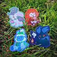 Image 1 of 2" Vinyl Seasonal Cryptid Stickers