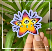 Three-eyed star die-cut sticker