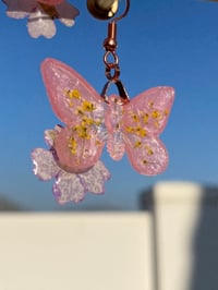 Image 3 of Pink Resin Butterfly Shaped Earrings with Real Flowers. Rose Gold Plated.