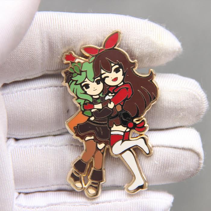 Image of Collei and Amber enamel pin