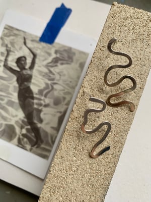 Image of "Drifting between each other" silver wiggly studs