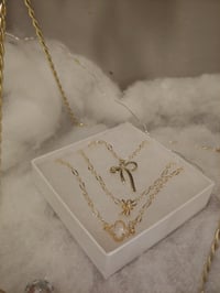 Image 1 of The Gold Bow Collection