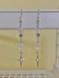Image 1 of cyber metal star earrings