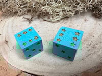 Image 2 of D6 Dice Pair Blue with Gold Star Pips