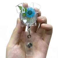 Image 2 of Colorful dried flower resin badge reel