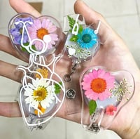 Image 1 of Colorful dried flower resin badge reel