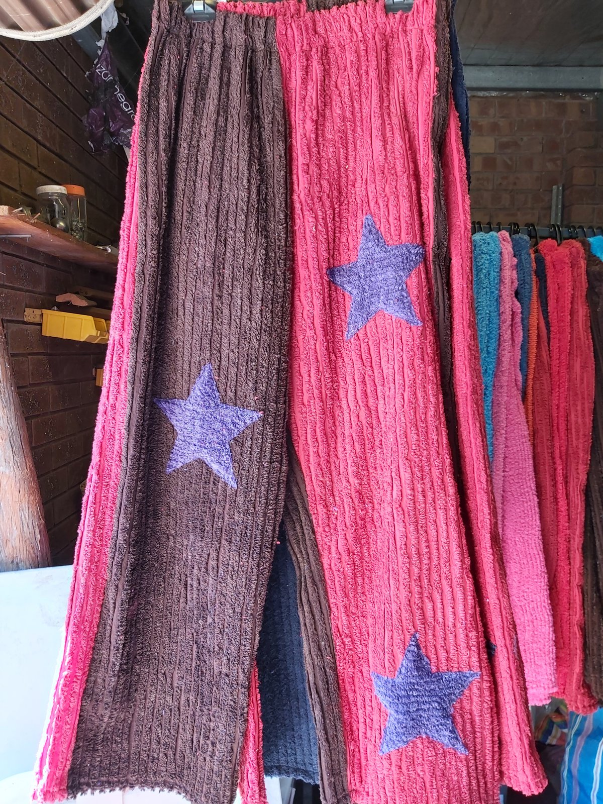Image of Star Pants Brown/red with purple stars